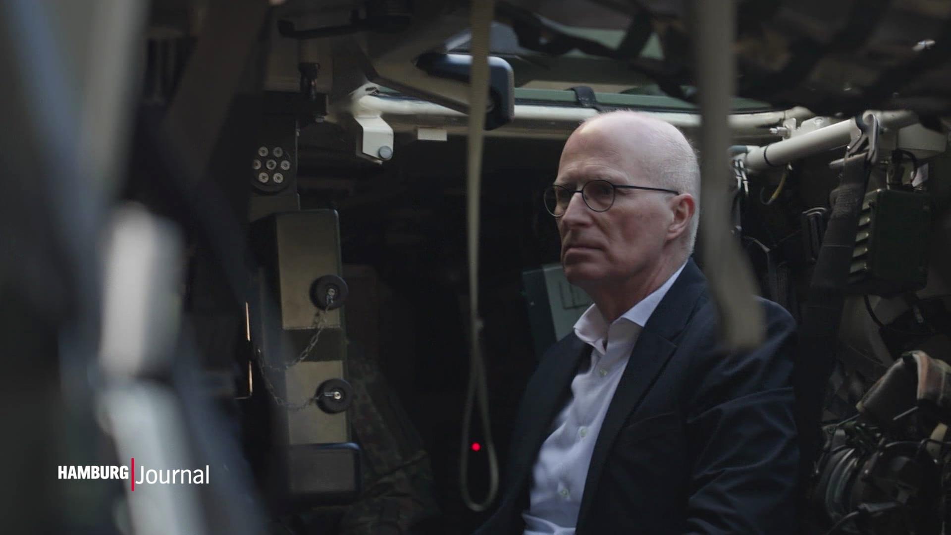 Peter Tschentscher sitzt in einem Panzer. | Screenshot