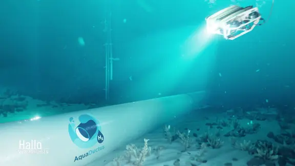 Eine Untersee-Wasserstoffpipeline wird von einem Forschungsuboot angeleuchtet.