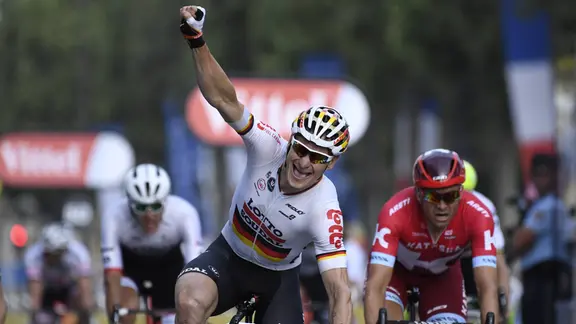 Der Radrennfahrer Andre Greipel jubelt
