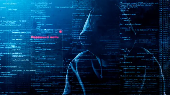 Schattenriss einer Person mit Computercodes