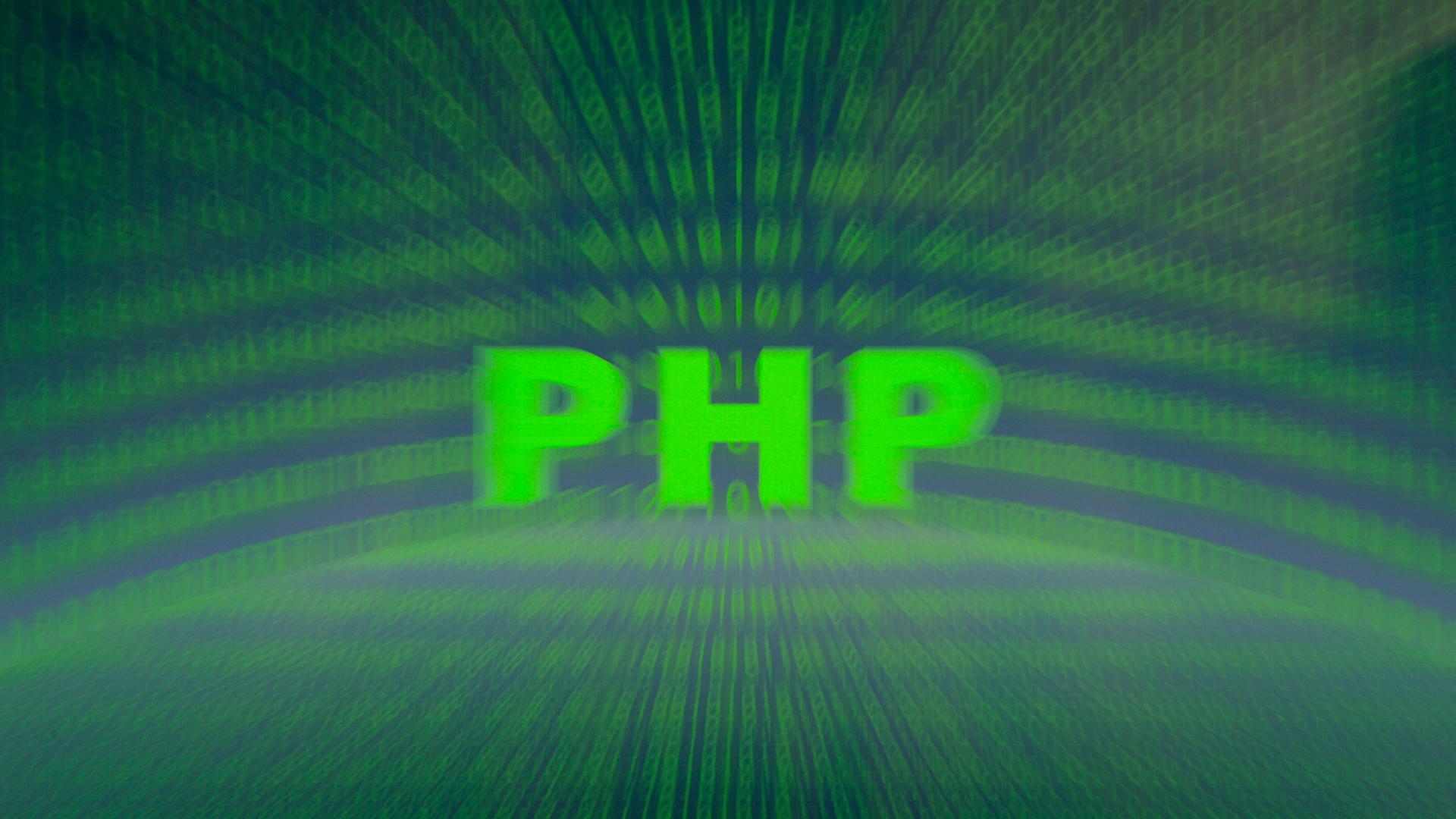 Die Buchstaben PHP werden vor einem Binär-Code dargestellt. | picture alliance / ZUMAPRESS.com | Andre M. Chang