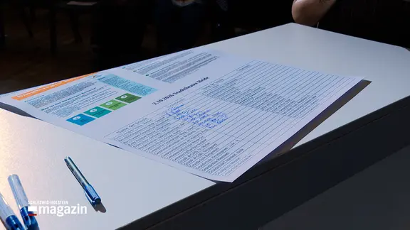 Ein Papier mit Unterschriften