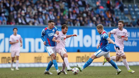 VfL Osnabrück has second division promotion in sight after victory against Cottbus.