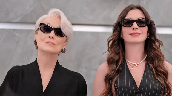 Meryl Streep and Anne Hathaway with sunglasses standing in an elevator - scene from "The Devil Wears Prada 2" | 2025 20th Century Studios. All Rights Reserved. Meryl Streep and Anne Hathaway with sunglasses standing in an elevator - scene from "The Devil Wears Prada 2"