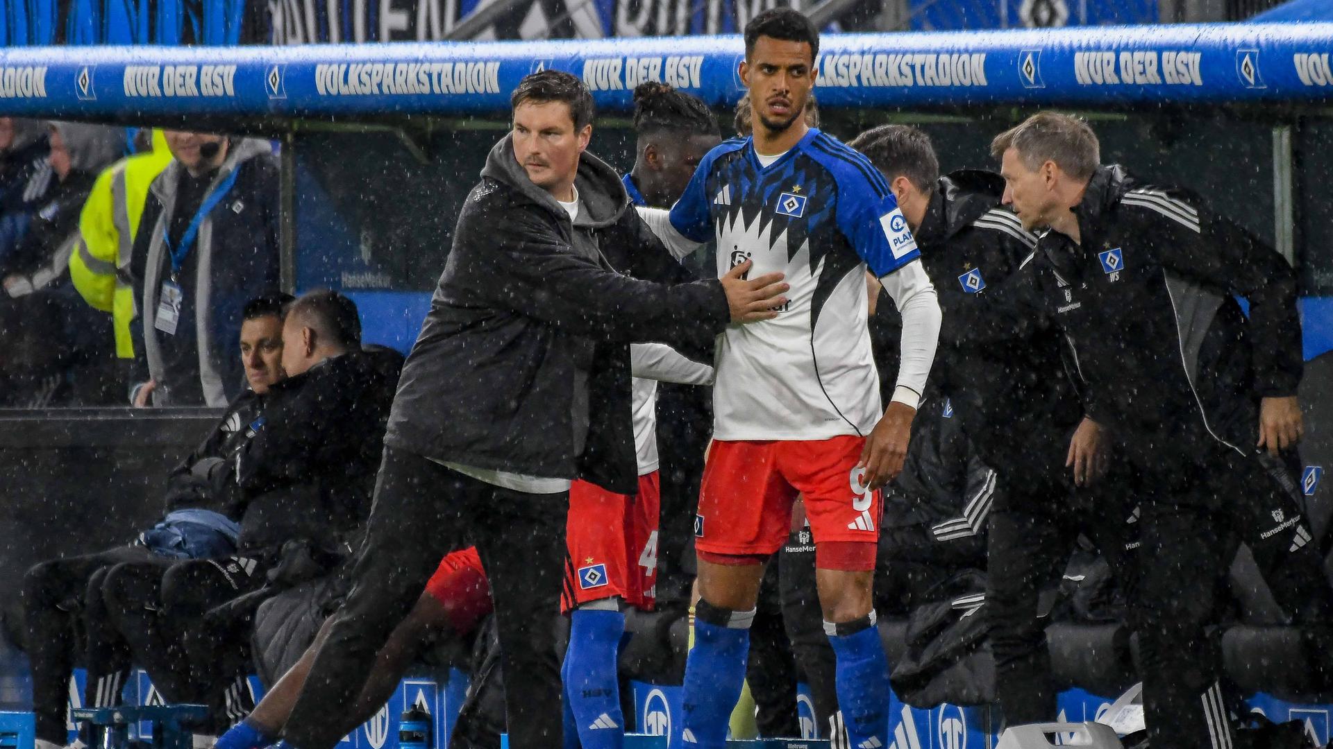 Тренер Мерлин Польцин и нападающий Роберт Глацель (слева направо) из «Гамбургского SV»