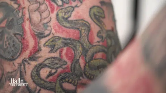 Schlangentattoo