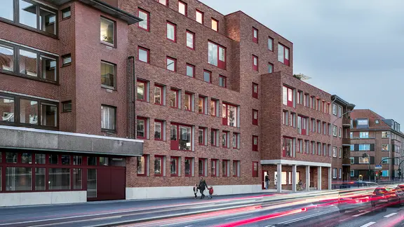 Eine Visualisierung des Bürogebäudes in Bergedorf, das zu einem Wohnhaus wird.